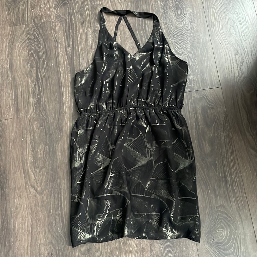 Black dress with metallic pattern